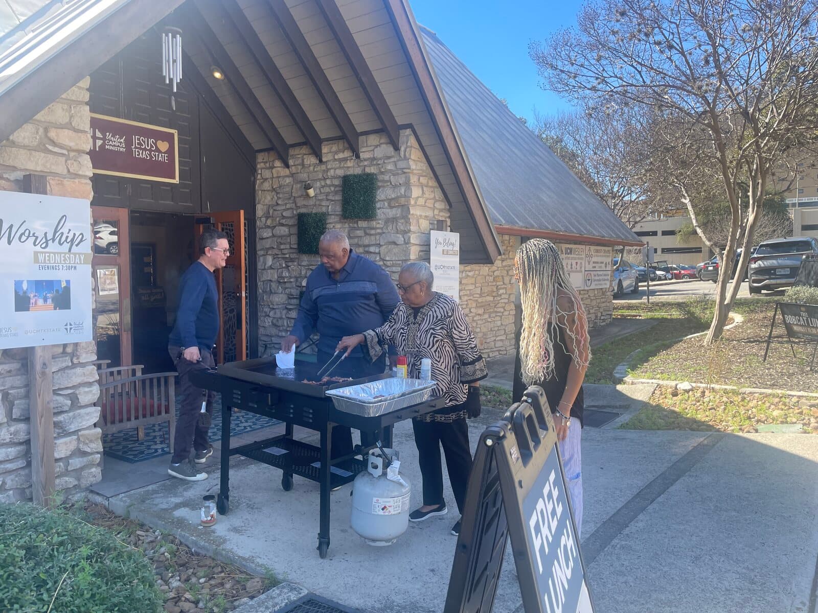Church members serving neighbors in the community.